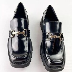 Elegant Black Loafers with Gold Accent
